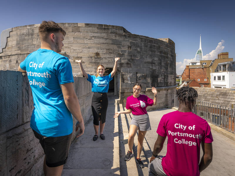 Former Highbury College and Portsmouth College students at the Round Tower in Old Portsmouth