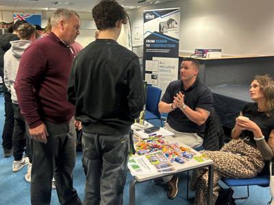 Students getting advice from one of the stalls at the Construction Careers Fair