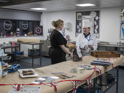 Two staff members in a patisserie classroom at City of Portsmouth College 