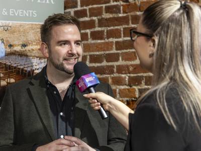 Assistant principal David Lycett is interviewed by a student ambassador at the COPC x Unloc dinner