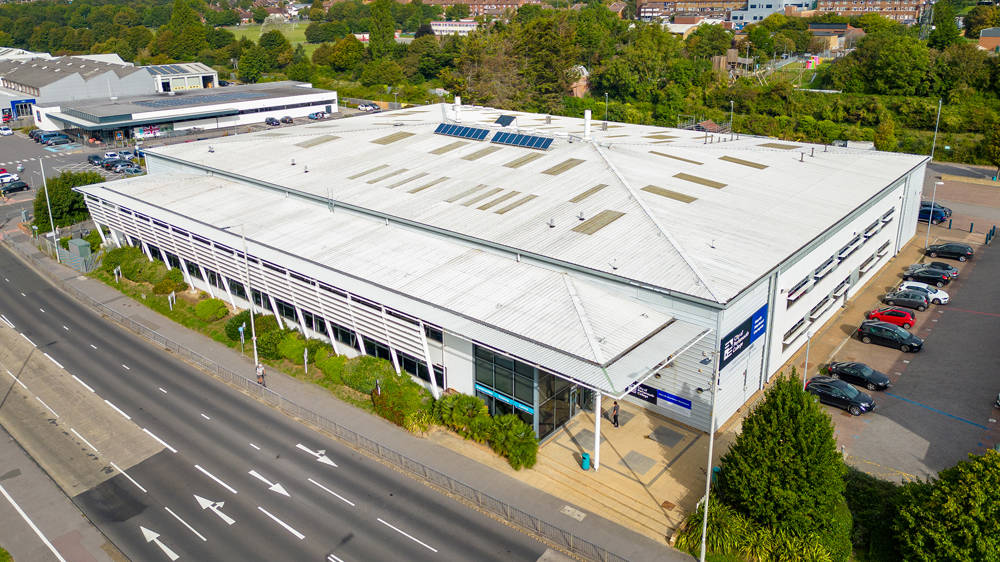 North Harbour Campus building at City of Portsmouth College located beside the main road in Portsmouth.