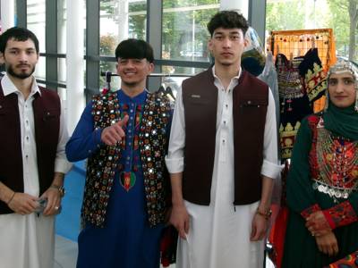 Men's and women's traditional dress at Culture Day 2026