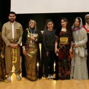 Students and staff - some in their traditional dress - pose for COPC's Culture Day 2026