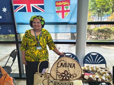 A member of COPC staff represents Fiji at Culture Day