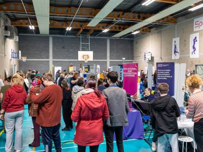 A general scene of the Moving Forwards event, featuring a crowd of people