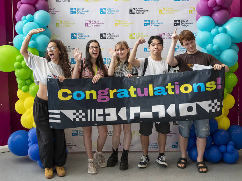 Joyful students celebrating at our Sixth Form Campus