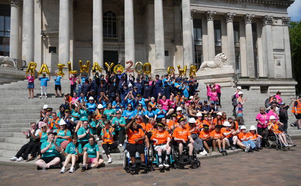 City of Portsmouth College students taking part in a flashmob for 200 years of the Great Western Railway on the steps of Portsmouth Guilldhall