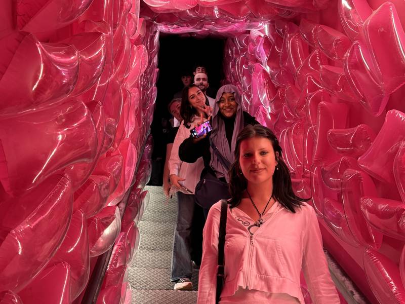 COPC students on stairs during their Madrid visit